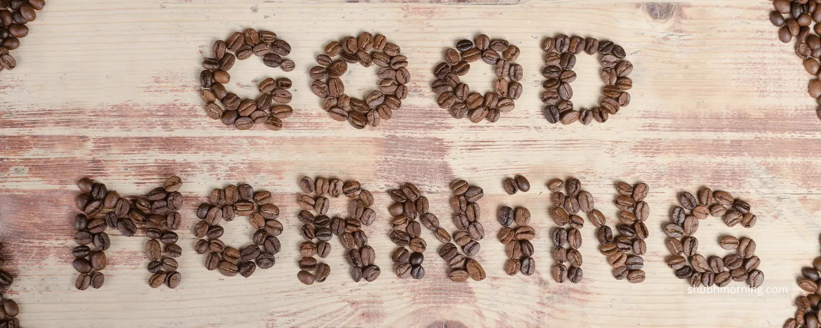 GOOD MORNING spelled out in coffee beans on pale wood